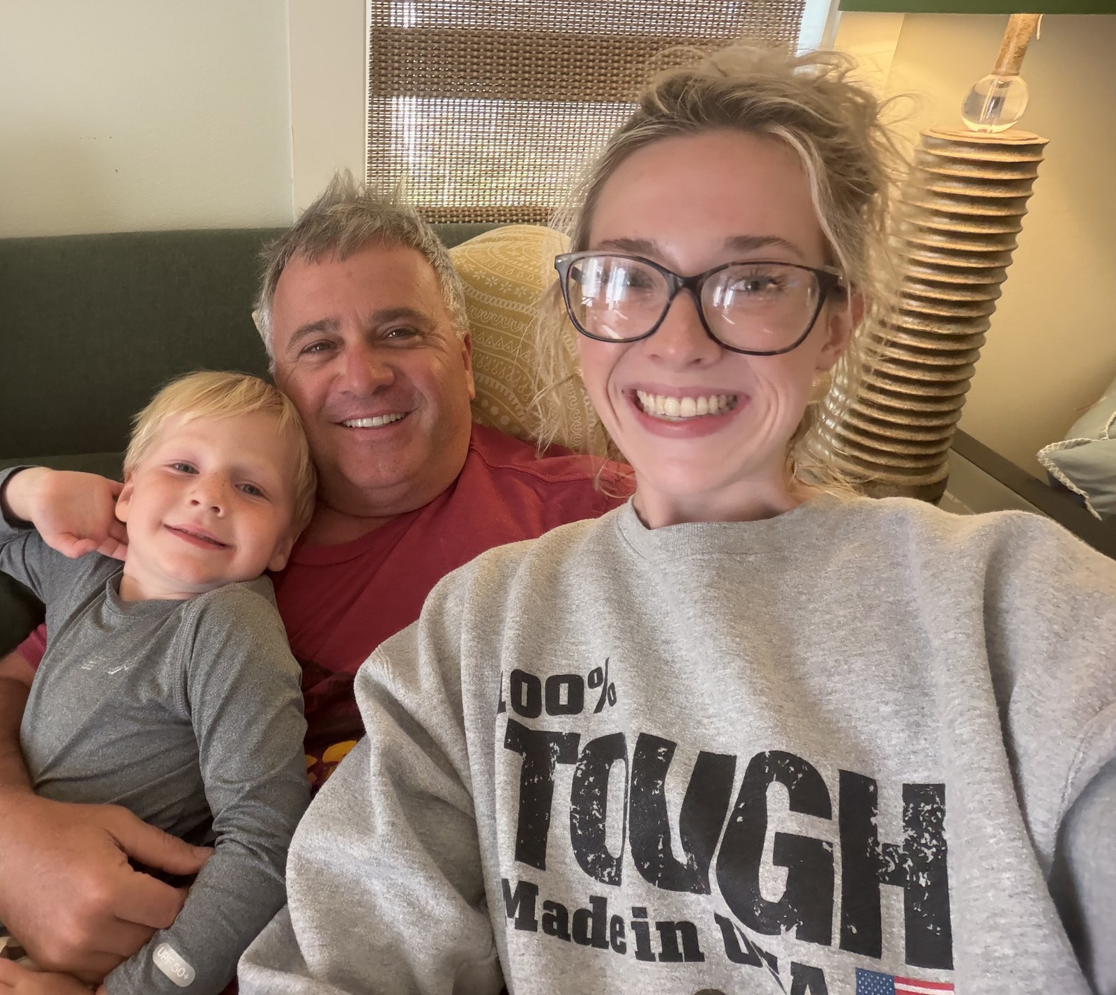 Whitt Shuford on the couch with his grandson Duke David and his daughter Whittlee